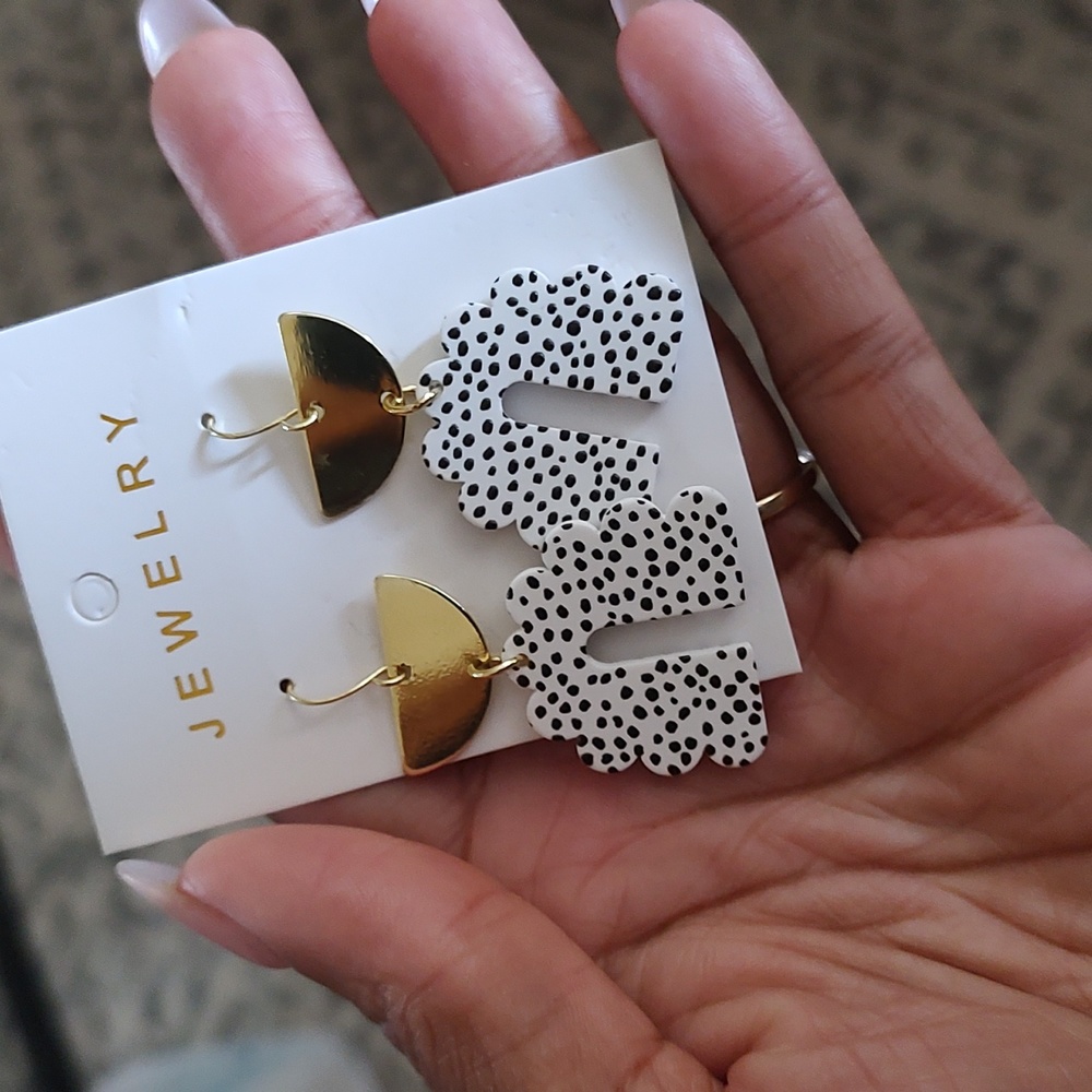 Gold and spotted earrings